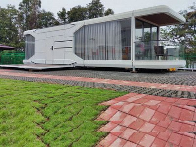 modern prefab glass house with parking solutions