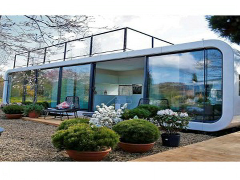 prefabricated glass house plans with permaculture landscapes from Algeria